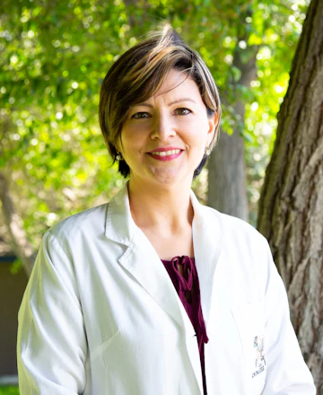 Dr. Maria, a physician
